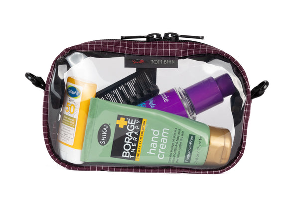 An Acai purple with white grid pattern (Halcyon) 3D Clear Organizer Cube filled with sundries.